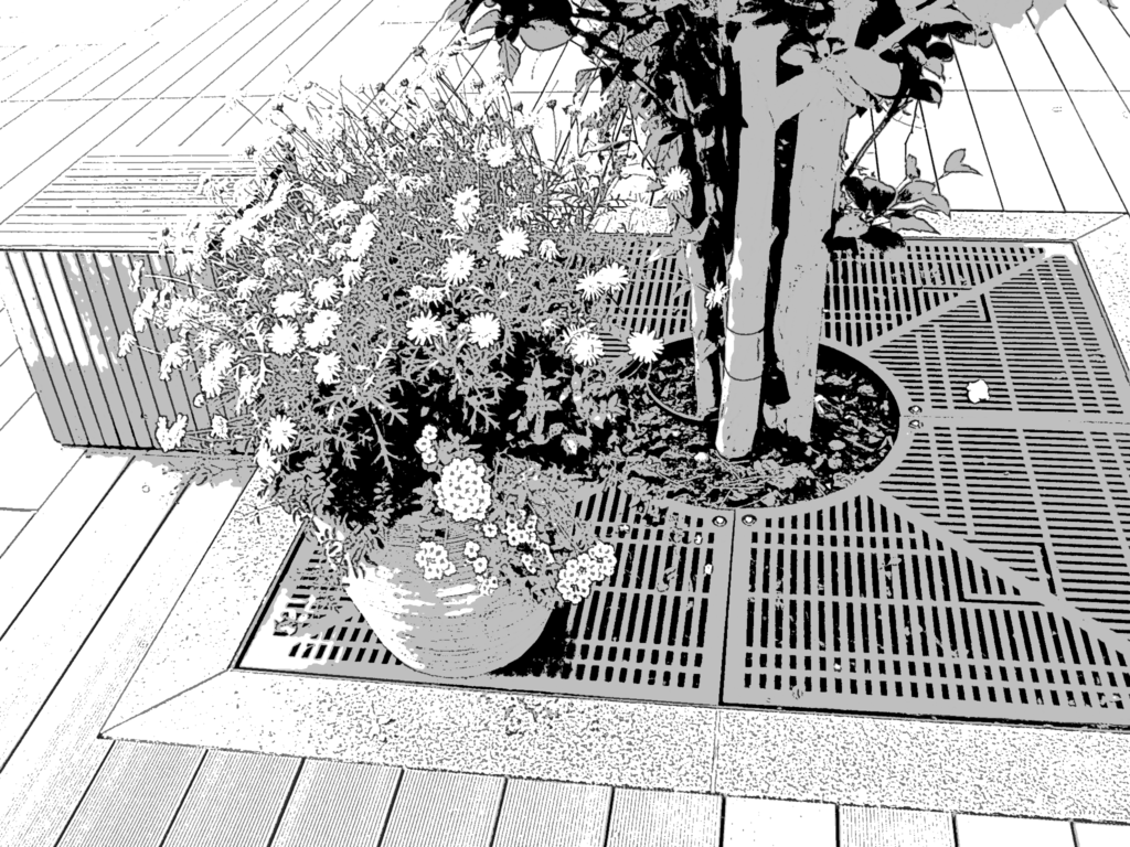 花と植樹桝と立方体ベンチ_漫画風加工